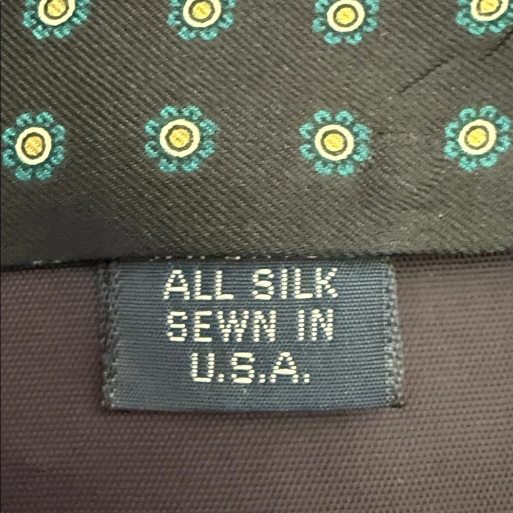 NEIL MARTI. 100% Silk tie Black and Blue Patterned